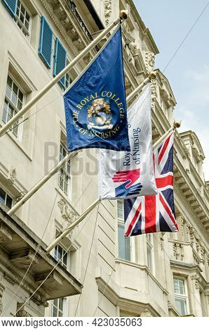 London, Uk - April 21, 2021: Flags Outside The Royal College Of Nursing Headquarters Which Represent