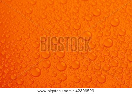 Water Drops On Orange Background