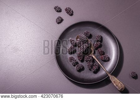 Blackberries On A Ceramic Plate, Frozen Fruits For A Healthy Food Diet