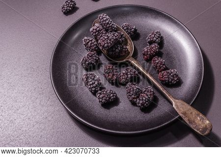 Blackberries On A Ceramic Plate, Frozen Fruits For A Healthy Food Diet