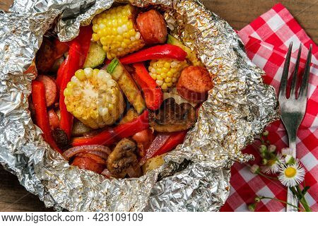 Grilled Barbecue Kielbasa Foil Packet With Corn On The Cob