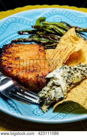 Marinated Char-grilled Pork Chops With Green Beans And Artichoke Spinach Dip