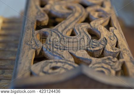 Carved Wooden Cover Of An Ancient Musical Instrument Hurdy-gurdy (wheeled Lyre) With The Image Of A 