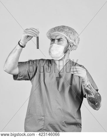 Nurse Man Wear Respirator Mask Hold Blood Test. Symptoms Of Acute Respiratory Infection. New Virus S