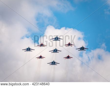 Moscow, Russia - May, 05, 2021: Diamond-shape Of 4 Mig-29 The Russian Knights And 5 Su-27 Swifts In 