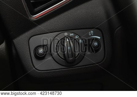 Novosibirsk, Russia - June 08, 2021: Ford Kuga, Close-up Of The  Headlight Setting Buttons