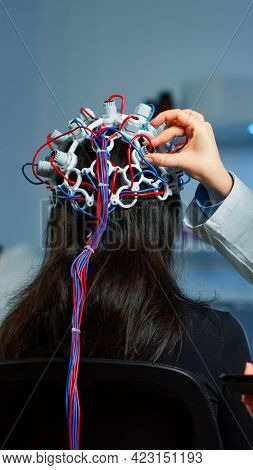 Woman Patient Wearing Performant Eeg Headset Scanning Brain Electrical Activity In Neurological Rese