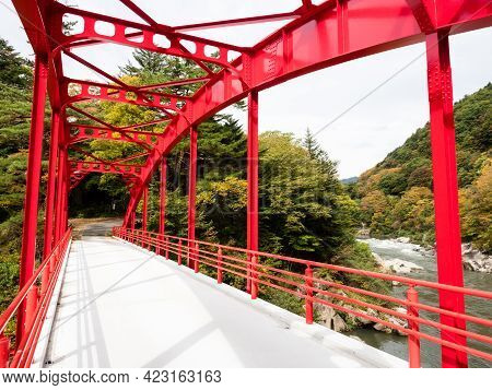 Red Bridge Over The Kiso River At Kiso-no-kakehashi, A Scenic Spot In Kiso Valley - Nagano Prefectur