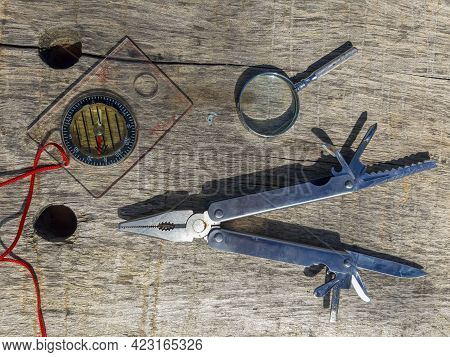 Seweweekspoort, South Africa - April 6, 2021: Tools For Surviving In The Wilderness - A Compass, Mag