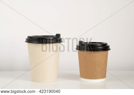 Two Coffee Cup Mockup On The White Background. Empty Cups For Americano And Cappuccino On The Table.