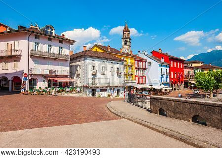 Ascona, Switzerland - July 10, 2019: Port, Church And Colorful Houses Located In Ascona City Near Lo