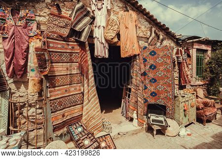 Ayvalik, Turkey: Street Market With Antique Asian Carpets In Vintage Shops On 27 April, 2021. Ayvali