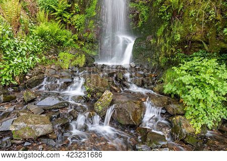 Long Exposure Of The Hollowbrook Waterfall On The South West Coastpath From Woody Bay To Heddons Mou