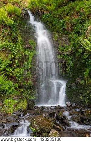 Long Exposure Of The Hollowbrook Waterfall On The South West Coastpath From Woody Bay To Heddons Mou
