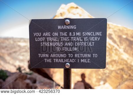 Warning Sign On Syncline Loop Trail In Canyonlands National Park