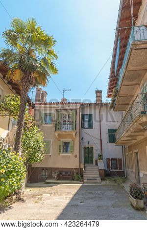 Courtyard In The Old Town Of Lovran On The Adriatic Coast, Croatia.
