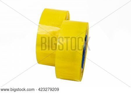 Studio Lighting. The Background Is White. Yellow Scotch Tape. Close-up