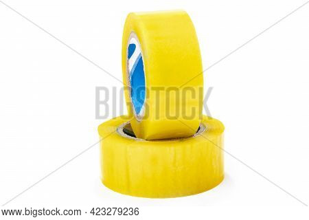 Studio Lighting. The Background Is White. Yellow Scotch Tape. Close-up