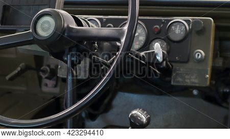 Old Soviet Military Vehicle Luaz-967, Cockpit View. Front End Conveyor. Steering Wheel, Gearbox And 
