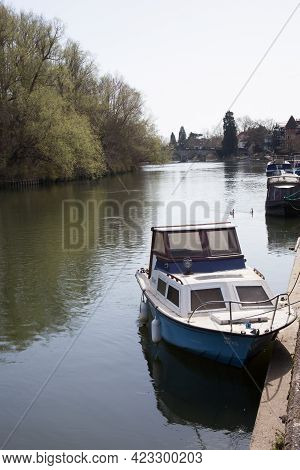 A Small Boat Moored Along The Thames River In Maidenhead In The Uk, Taken On The 30th March 2021