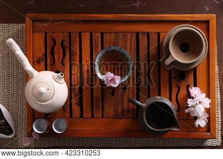 Beautiful Set For Traditional Tea Ceremony On Wooden Table, Flat Lay