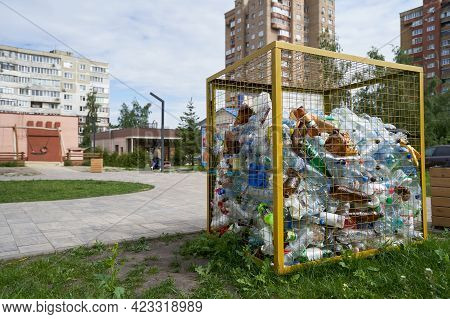 Stariy Oskol, Russia - June 2, 2021: Urn In The City For Collecting Plastic Bottles For Recycling