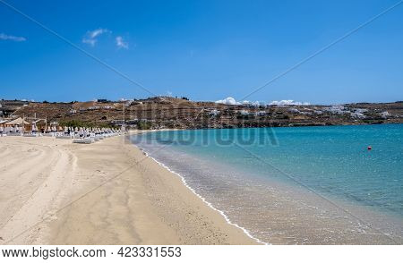 Sandy Beach, Ocean Sea Water Touches Wet Sand, Summer Vacations Concept