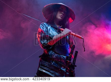 Futuristic Female Samurai With Sword Inside Studio