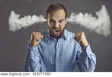 Angry Business Man Shouting With Steam Coming Out Of Ears Isolated On Grey Background