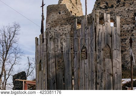 Medieval Gothic Castle Kostomlaty Or Sukoslav Under Snow, Grey Stone Ruin On Hill At Sunny Winter Da