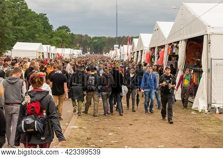Kostrzyn Nad Odra, Poland - July 15, 2016: People Walking Between The Commercial Tents At The Przyst