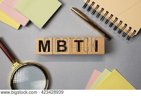 Mbti Acronym, Letters On Wooden Dices On Desk With Stationery. Psychological Test Concept.