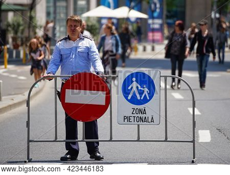 Bucharest, Romania - June 08, 2021: Fence With Signs Prohibiting Car Traffic On Calea Victoriei. Sev