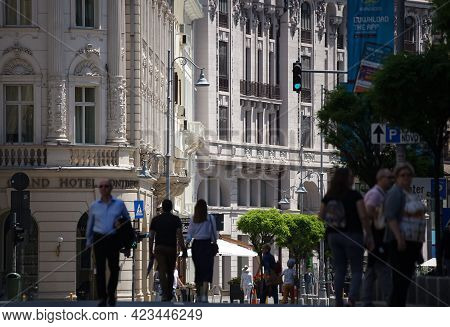 Bucharest, Romania - June 08, 2021: People Are Walking On Calea Victoriei. Several Streets In The Ce