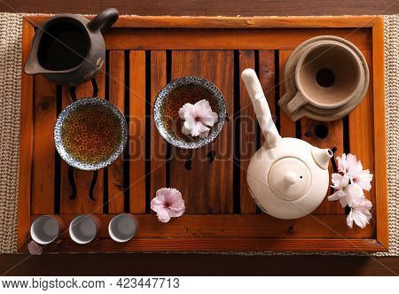 Beautiful Set For Traditional Tea Ceremony On Wooden Table, Flat Lay