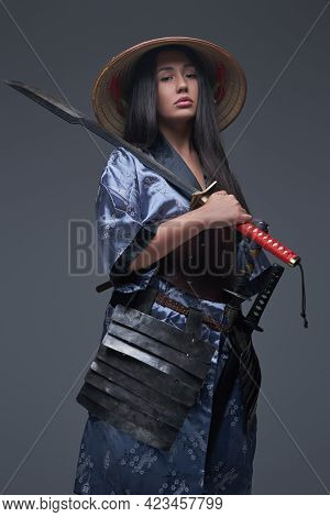 Female Japanese Killer With Samurai Sword And Hat