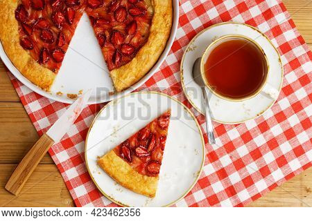 Homemade Open Pie Gallet With Strawberries And Rhubarb On Table. Top View.