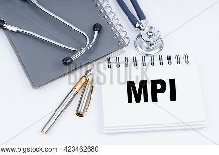 Medicine And Health Concept. On The Table Are A Stethoscope, A Pen And A Notebook With The Inscripti