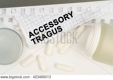 Medicine And Health Concept. On The Table Is An Open Jar Of Pills And A Sheet Of Paper With The Insc