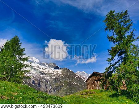 Scenic Mountain View Of A Old Stone House In The French Alps. Le Monal, Savoie. France.