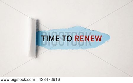 Time To Renew Message Written Under Torn Paper.