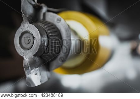 Close Up View Of An Unguided Bomb Attached To A Wing Of A Fighter Airplane. Concepts Of Bombing And 