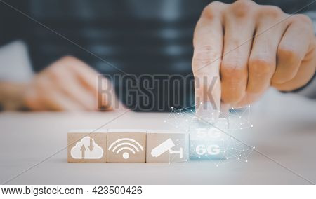 Start Success Business 5g To 6g  Beginning Business Successful, Hand Holding Wood Cubes With Icon An