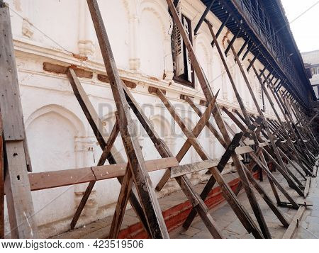 Nepalese Worker People Renovate Repair Build Scaffolding Structure At Ancient Ruins Antique Building