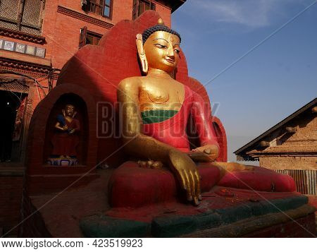 Buddha Statue Nepalese Style At Swayambhunath Pagoda Or Swayambu Chedi Or Swoyambhu Stupa Or Monkey