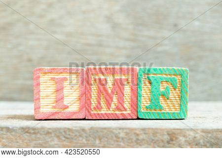 Color Alphabet Letter Block In Word Imf (abbreviation Of International Monetary Fund) On Wood Backgr