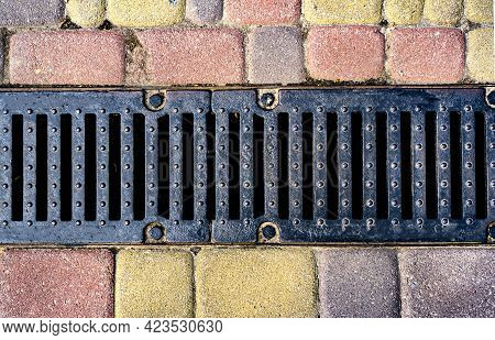 Stormwater Cast Iron Drainage System In A Pavement. Is Used For Drainage And Separation Of Water Fro