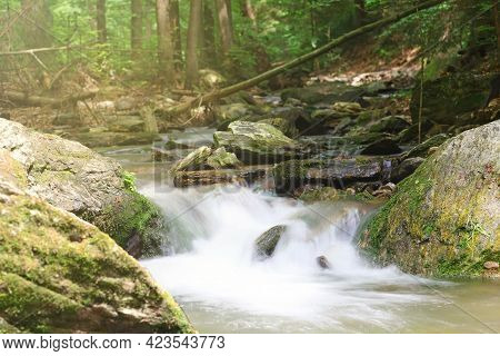 Silky Effect Of Small Waterfall In A Brook At Resovske Vodopady Park. Czech Republic.