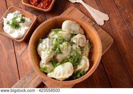 Homemade Dumplings, Dagestan Cuisine, Kurze. Dumplings Kurze With Meet Filling, And Adjika Hot Sauce