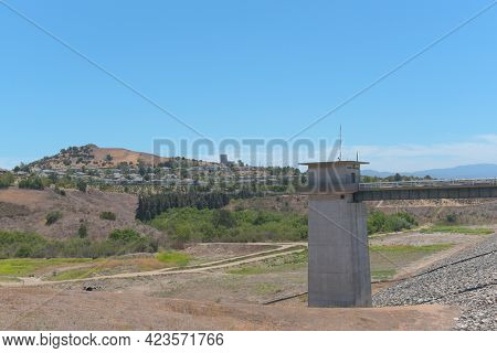 BREA, CALIFORNIA - 9 JUN 2021: The Carbon Canyon Dam, was constructed in 1959 as a response to Orange Countys growth and its need for flood control.